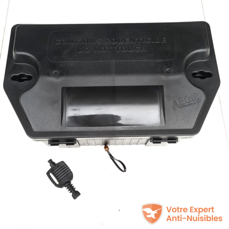 Vue du dessus du piège à rat sécurisé avec sa clé